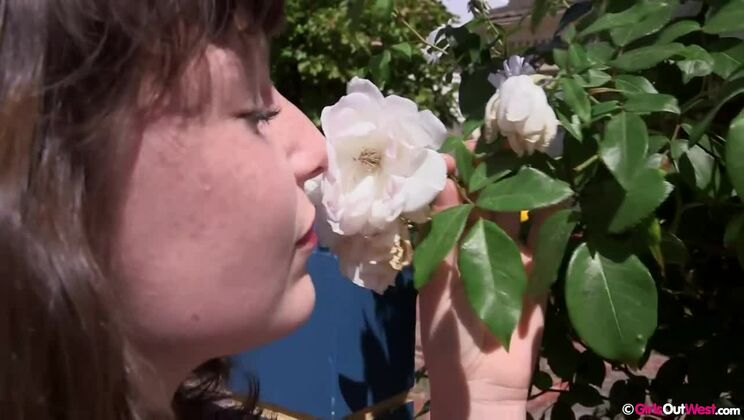 Brunette Sheryl plays with roses in hot solo scene